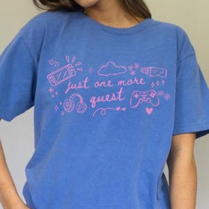 Blue oversized gamer girl shirt with pink just one more quest design styled as cozy casual outfit