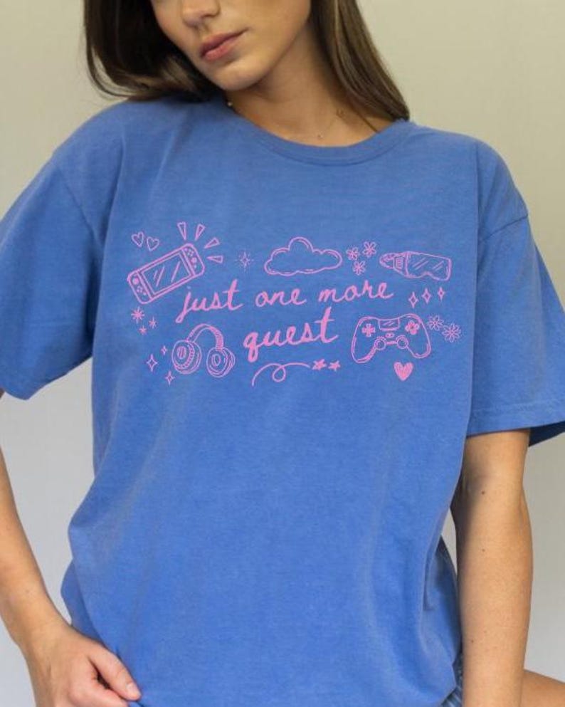 Blue oversized gamer girl shirt with pink just one more quest design styled as cozy casual outfit