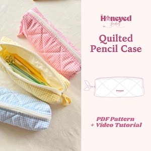 May include: Three quilted pencil cases in pink, yellow, and blue gingham patterns. The yellow case is open, revealing pens and a decorative charm. The cases have white zips and are diamond-stitched. Text on the right reads "Quilted Pencil Case" and "PDF Pattern + Video Tutorial."