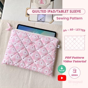 May include: A quilted iPad or tablet sleeve featuring a pink and white gingham pattern with small red hearts, a zipper closure with a pink ribbon pull, and a small bow detail. The text reads QUILTED IPAD/TABLET SLEEVE, Sewing Pattern, A4, A0, LETTER, PDF Pattern, Video Tutorial, and 2 sizes.