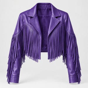 May include: A cropped purple jacket featuring long fringe detailing across the chest, shoulders, and sleeves. The jacket has a classic notched lapel collar, long sleeves with cuffs, and a smooth finish, presenting a structured silhouette.