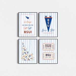 May include: Four framed prints with blue and white striped backgrounds. The prints feature Boise State University themes, including a pennant, the state of Idaho with floral accents, and text that reads "Go Orange, Fight Fight BSU!"