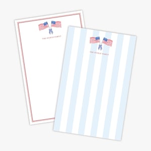 May include: Two sheets of stationery with an American flag design. One sheet has a red border, the other has blue and white stripes. Both sheets have the text "THE NICKLE FAMILY" printed below the flags.