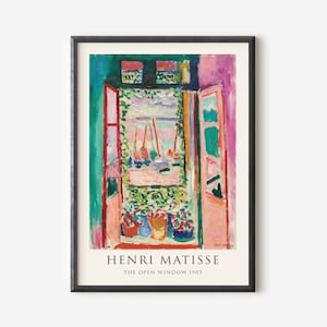 May include: A framed print of Henri Matisse's "The Open Window 1905." The artwork depicts a vibrant, colorful view through an open window, showcasing boats on the water and potted plants. The frame is black.