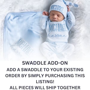 May include: A blue baby swaddle blanket with the name "MICHAEL hassan" embroidered on it.  The swaddle is shown with a matching blue baby hat and outfit with the same name embroidered on it.  Add a swaddle to your existing order by simply purchasing this listing! All pieces will ship together.