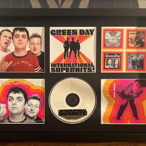 Green Day | International Superhits | Retro Mounted CD Wall Display | Frame Not Included |