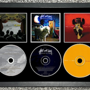 Fall Out Boy | From Under The Cork Tree | Infinity On High | Folie A Deux | Retro Triple CD Wall Display | Frame Not Included |