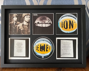 Oasis / No creas la verdad / Exhibidor de pared de CD retro / Marco no incluido /