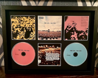 Oasis / Time Flies 1994-2009 / Exhibidor de pared doble para CD estilo retro / Marco no incluido /