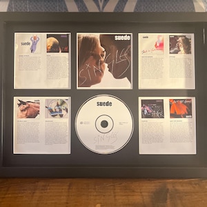 Suede | Singles | Retro Mounted CD Wall Display | Frame Not Included |