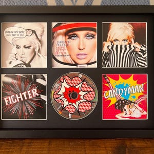 Christina Aguilera | Keeps Getting Better : A Decade Of Hits | Retro Mounted CD Wall Display | Frame Not Included |