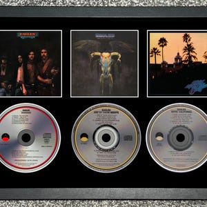 The Eagles | Desperado | One Of These Nights | Hotel California | Triple CD Wall Display | Frame Not Included |
