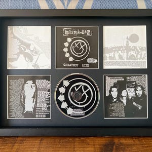 Blink 182 | Greatest Hits | Retro Mounted CD Wall Display | Frame Not Included |