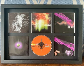 Incubus / Hazlo tú mismo / Exhibidor de pared de CD retro / Marco no incluido /