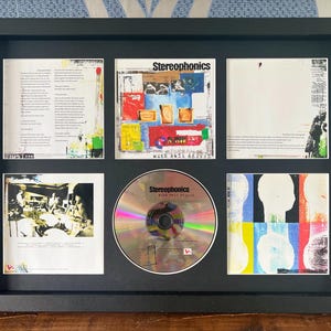 The Stereophonics | A palavra se espalha Exibição de CD de parede retrô montada | Moldura não incluída |