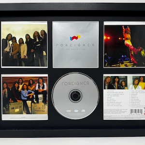 Foreigner | The Definitive | Retro montowany na ścianie stojak na płyty CD | Rama nie jest dołączona |