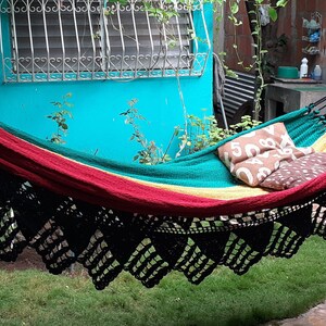 Double size rasta color hammock. Pointed  black fringe.