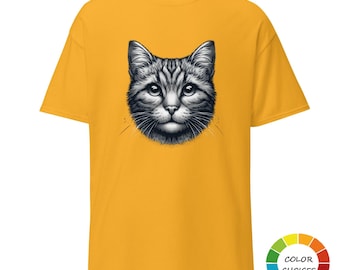 May include: Mustard yellow t-shirt with a detailed black and white illustration of a cat's face. The cat's fur is intricately shaded, and the design is centered on the shirt. A colour palette wheel is in the lower right corner.