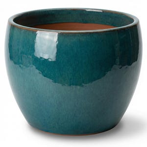 Könnte beinhalten: Ein teal-farbener, glasierter Keramik-Pflanztopf mit runder Form. Der Topf hat eine glänzende Oberfläche und einen kontrastierenden braunen Innenraum. Das Design ist schlicht und modern, geeignet für den Innen- oder Außenbereich. Der Topf ist leer.