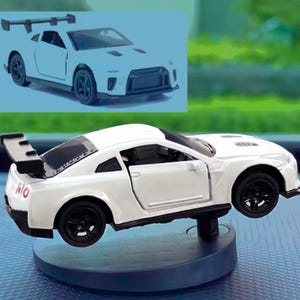 Juguete para salpicadero de coche: modelo de derrape giratorio, divertido adorno deportivo para hombre, accesorio original para el interior del coche.