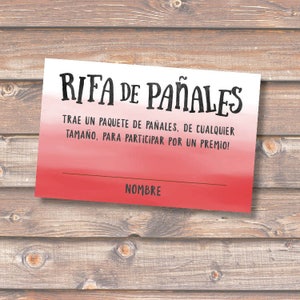 May include: A red and white gradient card with the text "RIFA DE PAÑALES" in black. The text below reads "TRAE UN PAQUETE DE PAÑALES, DE CUALQUIER TAMAÑO, PARA PARTICIPAR POR UN PREMIO!" and "NOMBRE" at the bottom.
