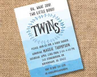 May include: Blue and white watercolor baby shower invitation with the text "Oh, what joy! Two little boys!" and "Twins" in a wreath. The invitation includes the date, time, and location of the shower, as well as the name of the honoree, Maggie Thompson.