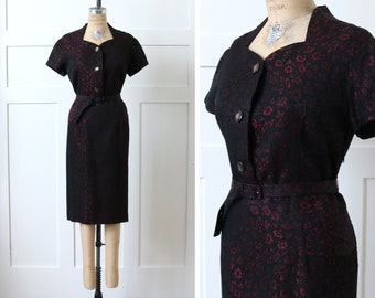 vintage 1960s red & black dress • tailored belted brocade wiggle dress with short sleeves and hip detail