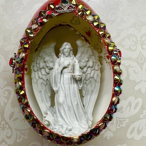 Hand made unique embellished real goose egg.  Lovely gift for all seasons and holidays.