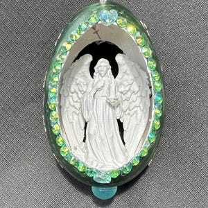Hand made unique embellished real goose egg.  Lovely gift for all seasons and holidays.