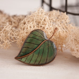 Dark green leaf brooch