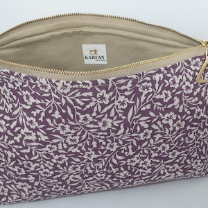 Estuche, neceser, cartera de mano, guarda todo lo que quieras. Tiene gran capacidad.(Artículos no incluidos, sólo son para la foto)