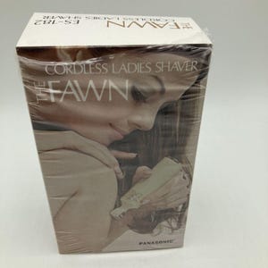 Panasonic sladdlös rakapparat från 1970-talet, Fawn ES-182, nagelfilsbuffer.
