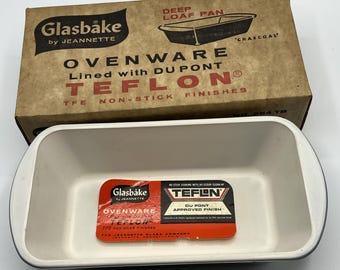 Molde para pan Jeannette Glasbake vintage, antiadherente, de vidrio gris.