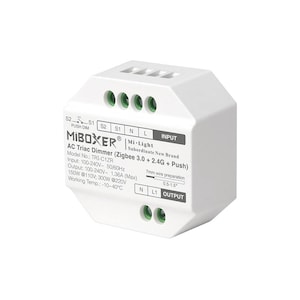 Puede incluir: Atenuador de triac AC Mi-Light blanco con tecnología Zigbee 3.0 + 2.4G + Push. El dispositivo tiene terminales de entrada y salida etiquetados con N, L y L1. Tiene un rango de temperatura de funcionamiento de -10 a 40 grados Celsius.