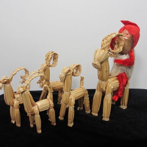 Vintage Scandinavian Straw Reindeer with Santa & 4 Small Reindeer