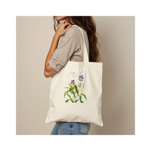 Premium Einkaufstasche.  100% Baumwolle. Langer Griff. Natürlich. Stilvolle Blumenkunst-Einkaufstasche.  Mary Vaux Wilcott Blumenillustration. LOCKIGE CLAMATIS.