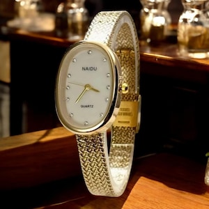 Vintage Women’s Gold Watch | Elliptical Dial Quartz Watch | Elegant Retro Gift for Her | Christmas, Birthday, or Special Occasion.
