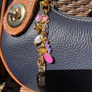 purple smile bag charm