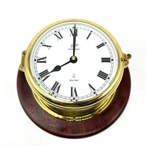 Vintage schatz ship’s bell clock – brass case on wood base, west germany