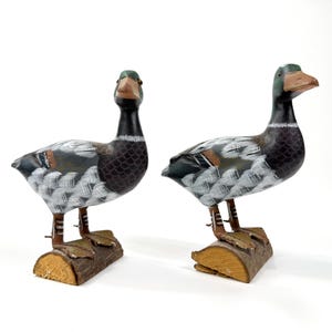 Set of 2 vintage hand painted wood duck decoys - rustic carved wooden bird sculptures