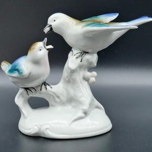 Vintage mid century ceramic birds made in germany with makers stamp.