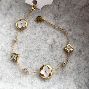 Gold & white clover bracelet