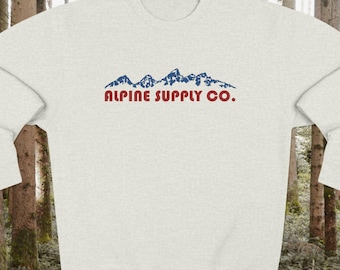 Minimalistyczna koszula z okrągłym dekoltem w stylu vintage z motywem górskim | Logo firmy Alpine Supply Company