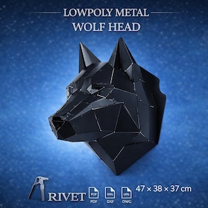 May include: A black, low-poly metal wolf head sculpture. The artwork is mounted on a wall and measures 47 x 38 x 37 cm. The image includes the text "LOWPOLY METAL WOLF HEAD" and the brand name "RIVET".