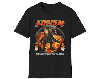 May include: Black t-shirt featuring a graphic of a Tyrannosaurus Rex with a cat riding it, set against a rainbow and explosion background. The word "AUTISM" is above the image, and the text "THEY ALWAYS TELL ME THAT I'M SPECIAL" is below.