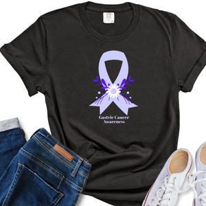 Camiseta de sobrevivente do câncer gástrico, camiseta com laço azul-pervinca, camiseta de apoio à conscientização sobre o câncer de estômago, camiseta &quot;Eu sou um sobrevivente&quot;, camiseta do time do câncer, presente para o câncer