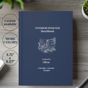 May include: A navy blue sketchbook for interior designers. The cover features the text "INTERIOR DESIGNER Sketchbook" and a line drawing of a room. The book measures 5.71" x 8.07". Additional text includes "Designed by Olivia" and "Concepts • Layouts • Designs."