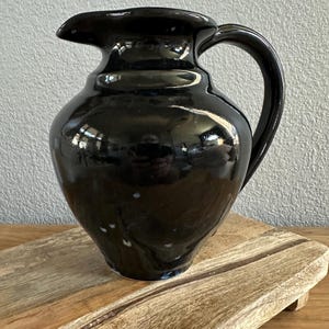 Vintage Handmade Clay Pitcher Black with Cool Blue Drip Detail 7”