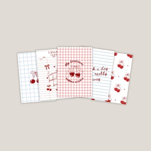 Puede incluir: Una colección de cinco tarjetas rectangulares con diseños de cerezas y texto. Las tarjetas presentan fondos de cuadrícula, rayados y estampados en blanco y rojo. El texto incluye "Library Card", "Currently booked" y "My Emotional Support Kindle".