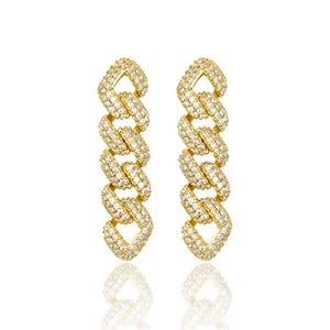 May include: A pair of gold-colored chain link earrings. Each earring features a series of interlocking links encrusted with small, clear gemstones. The earrings are displayed against a white background, with a slight reflection.